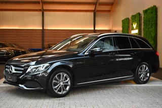 Hoofdafbeelding Mercedes-Benz C-Klasse Mercedes-Benz C-klasse Estate 180 Edition 1 - Panoramadak - Trekhaak - Leer - Stoelverwarming - Ambianceverlichting -