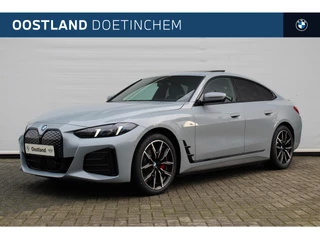 BMW i4 xDrive40 Gran Coupé M Sport / Schuif-kanteldak / Trekhaak / M Adaptief onderstel / Comfort Access / Parking Assistant Plus / Stuurverwarming