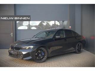 BMW 3 Serie 320e High Executive M Sport | Panoramadak | Harman Kardon | Carbon | Camera | Adaptive LED | Stoelverwarming | Stuurverwarming | Apple Carplay | Navigatie | Cruise Control | Memory Seat | Trekhaak | Keyless | Shadowline