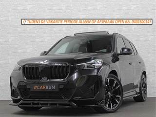 BMW X1 18i M-Sport Performance-Pack | Panorama | Sportstoelen | Carbon | Keyless-Entry | Sfeerverlichting | Achteruitrij-Camera | 5x op voorraad | Carplay | Full-LED | Black-Optic | Getint Glas | Stoelverwarming | Draadloos Laden |