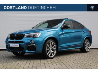 Hoofdafbeelding BMW X4 BMW X4 M40i High Executive M Sport Automaat / Schuif-kanteldak / Trekhaak / Sportstoelen / Comfort Access / Adaptieve LED / Head-Up / Harman Kardon / Stoelverwarming