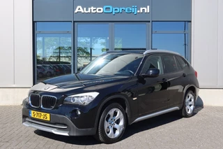 Hoofdafbeelding BMW X1 BMW X1 1.8i sDrive AUTOMAAT Executive 150pk Clima, NAVI, Cruise, Trekhaak afnb.