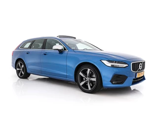 Hoofdafbeelding Volvo V90 Volvo V90 2.0 D4 R-Design Aut. *PANO | HEAD-UP | LEATHER-MICROFIBRE | FULL-LED | TOP-VIEW | BLINDSPOT | HEATED-SPORTSEATS | DIGI-COCKPIT | NAVI-FULLMAP | KEYLESS | ECC | PDC | CRUISE | TOWBAR | 18''ALU*