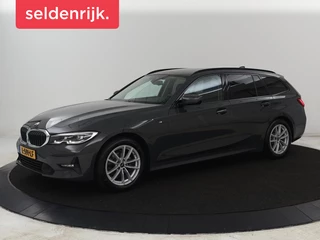 BMW 3-serie 318i Business Edition | Trekhaak | Sportstoelen |  Half leder | Adaptief LED | Carplay | Navigatie | Parkeerhulp | Climate control | Bluetooth | Cruise control