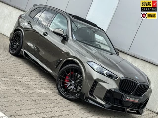 Hoofdafbeelding BMW X5 BMW X5 XDrive50e 490Pk M-sport Performance Pano 22Inch