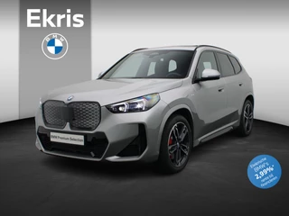 BMW iX1 eDrive20 67 kWh M Sportpakket Pro | Premium Pack | Comfort Pack | Travel Pack | Stuurwielrand Verwarmd | Trekhaak  | Panoramadak | Driving Assistant Plus | DAB | Harman Kardon | 19''