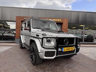 Hoofdafbeelding Mercedes-Benz G-Klasse Mercedes-Benz G-klasse AMG 63 Brabus Look Schuifdak Designo Stoelvent. Sterrenhemel G63 AMG 7 persoons
