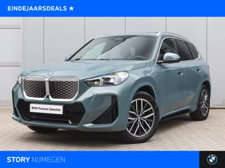 Hoofdafbeelding BMW iX1 BMW iX1 xDrive30 High Executive M Sport / Trekhaak / Sportstoelen / Adaptieve LED / Comfort Access / Parking Assistant Plus / Head-Up / M Adaptief onderstel