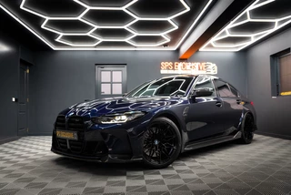 BMW M3 3-serie xDrive Competition / M-perf.parts / Pano / Carbon / Stoelverk. / H&k / HuD / Individual