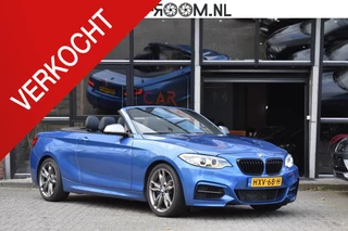 BMW 2-serie Cabrio M235i xDrive Centennial High Executive Camera Carplay Leder H&K Elekstoelen
