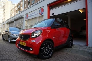 Hoofdafbeelding Smart Fortwo Smart Fortwo electric drive prime | LEER | NAVI | Verwarmd stuurwiel | Stoelverwarming |  Stoelverwarming | Cruise control | LED pakket | 15inch sportvelgen | Touchscreen Full Map Navigatie | BlueTooth interface | Mirrorlink/ Android Auto | Achteruitrijcamera | Parkeersensoren