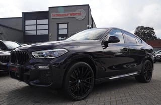 BMW X6 XDrive40i High Executive | Panorama | 360cam | Carbon | Adaptieve cruise control | Kristallen pook | 22 inch | Dealer onder