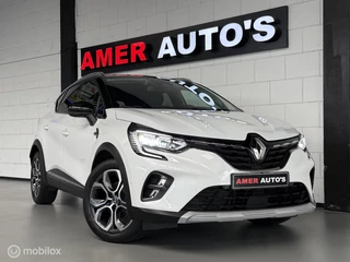 Renault Captur 1.6 E-Tech Plug-in Hybrid/parelmoerwit/1e eig