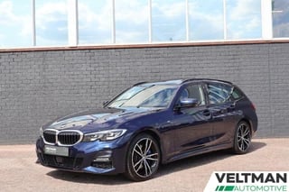 Hoofdafbeelding BMW 3 Serie BMW 3-serie Touring 330e M-Sport PANO HEAD UP ADAPTIVE CRUISE