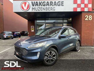 Ford Kuga 2.5 PHEV Titanium X // ADAPT. CRUISE // DODEHOEK // B&O SOUND // KEYLESS // NAVI+CARPLAY // WINTERPACK // FULL LED //