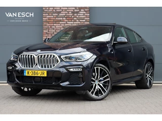BMW X6 xDrive40i High Executive M Sport Aut8 | Achterasbesturing | Panoramadak | Carbon | ACC | Memory | Rondomzicht Camera | Iconic Glow | Laser | HUD | Merino Leder | Trekhaak | Verwarmd Stuurwiel |