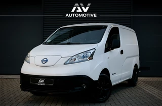 Hoofdafbeelding Nissan e-NV200 Nissan e-NV200 24 kWh | Airco | Camera | Stuur- en stoelverwarming | Trekhaak | Bluetooth | Nieuwe APK | 170KM Actieradius | Zero emissie | 100% elektrisch