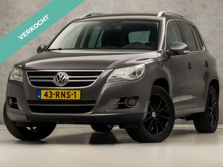 Volkswagen Tiguan 1.4 TSI Sport&Style 150Pk (NAVIGATIE, CLIMATE, GETINT GLAS, TREKHAAK, SPORTSTOELEN, CRUISE, PARKEERSENSOREN, NIEUWE APK, NIEUWSTAAT)