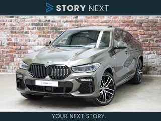 Hoofdafbeelding BMW X6 BMW X6 xDrive40i High Executive M Sport Pakket Automaat / Live Cockpit Professional / Driving Assistant Professional / Personal CoPilot Pack / Bowers & Wilkins / Active Steering / Panoramadak / Iconic Glow / Massagestoelen / 22 Inch / Individual Dashboard Leder / Laserlight