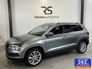 Hoofdafbeelding Škoda Karoq Skoda Karoq 1.0 TSI 115 pk handg. Ambition Buss. | Navi | Cruise | PDC | CarPlay | Clima | DAB | Org. NLD |