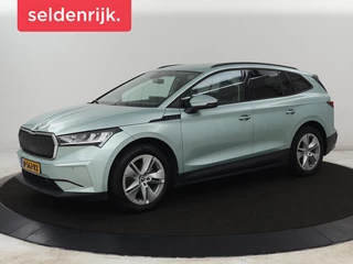 Skoda Enyaq iV 60 | Warmtepomp | Stoelverwarming | Camera | Keyless | Carplay | Navigatie | Half leder | Full LED | Cruise control | Parkeerhulp | Sfeerverlichting
