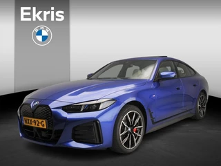 Hoofdafbeelding BMW i4 BMW i4 Gran Coupé eDrive35 | M-Sportpakket | LED | Leder | Navigatie | Schuifdak | Stoelverwarming | Sportstoelen | DAB | Harman-kardon sound | Alu 19 inch