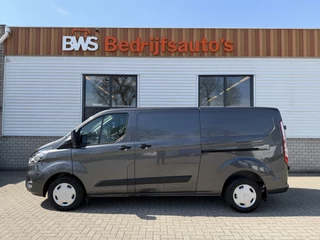 Ford Transit Custom 300 2.0 TDCI L2H1 Trend / vaste prijs rijklaar € 21.950 ex btw / dubbele schuifdeur / lease vanaf € 358 / airco / cruise / camera / pdc voor en achter / euro 6 / bpm vrij